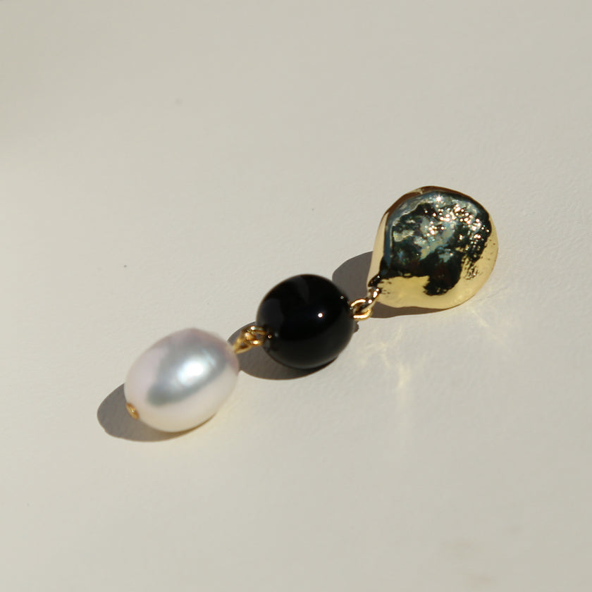 Gold black white triple drop pearl earrings.