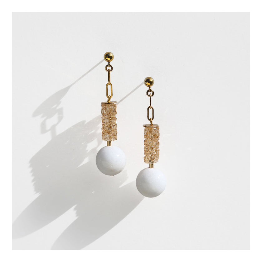 Champagne crystal column earrings with white orb.