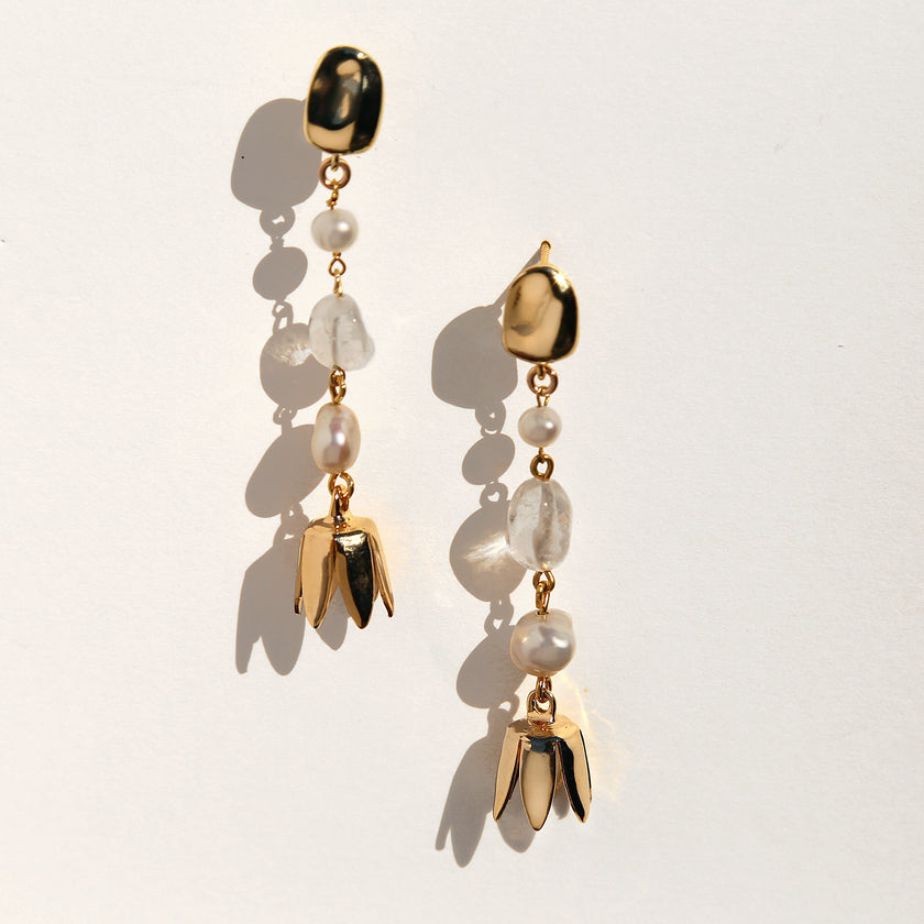 Floral gemstone pearl dangle earrings.