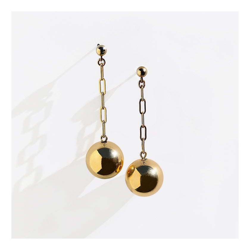 Paperclip chain gold ball drop earrings.