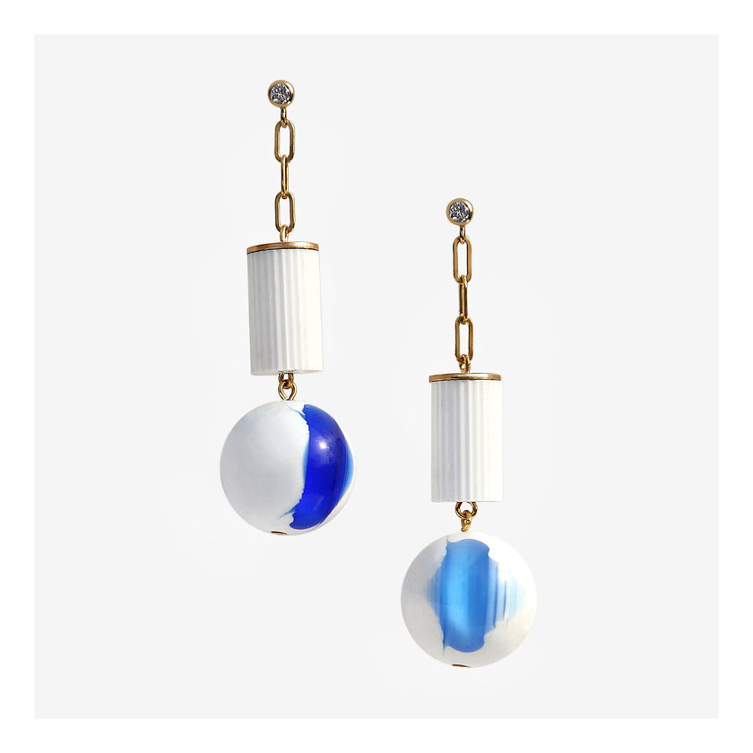 White lucite column blue orb earrings.