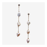 Long triple baroque pearl earrings with diamond stud