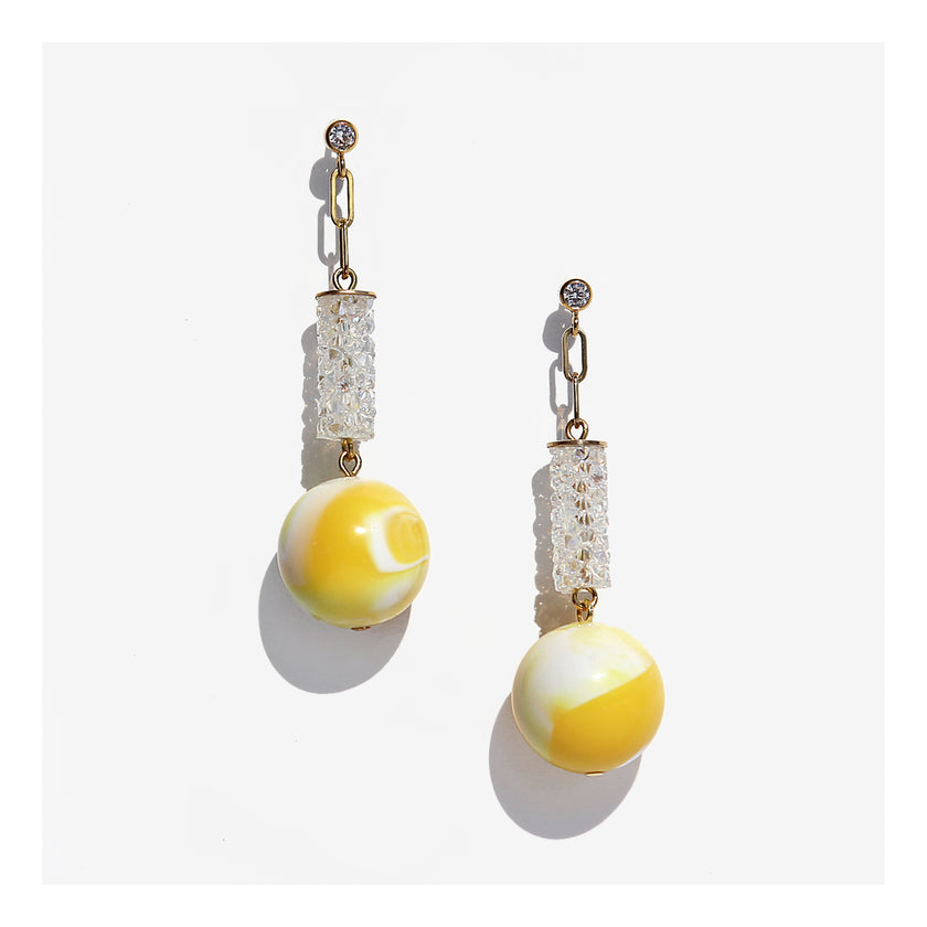 Dangle earrings with yellow orb and crystal tube.