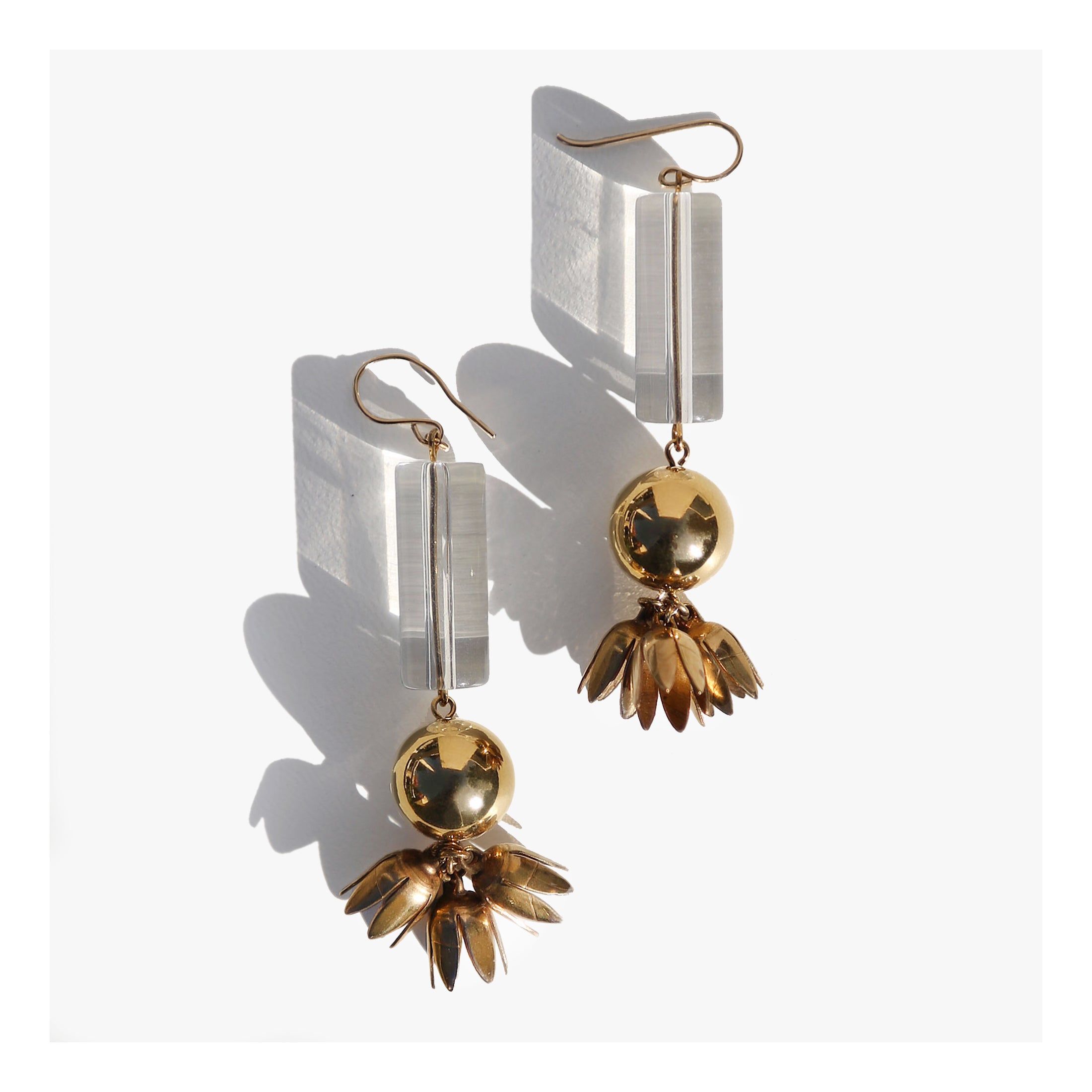 Lucite tube gold flower dangle earrings.