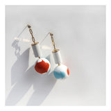 White lucite column and marbled retro orb drop earrings.